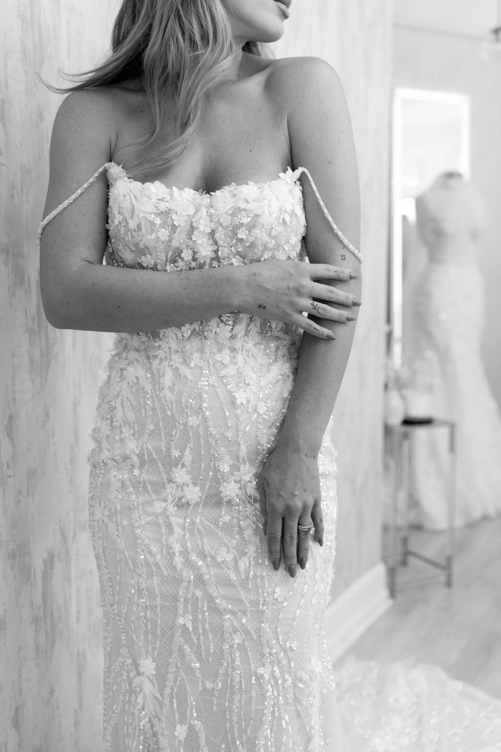 Fitted lace wedding gown detail