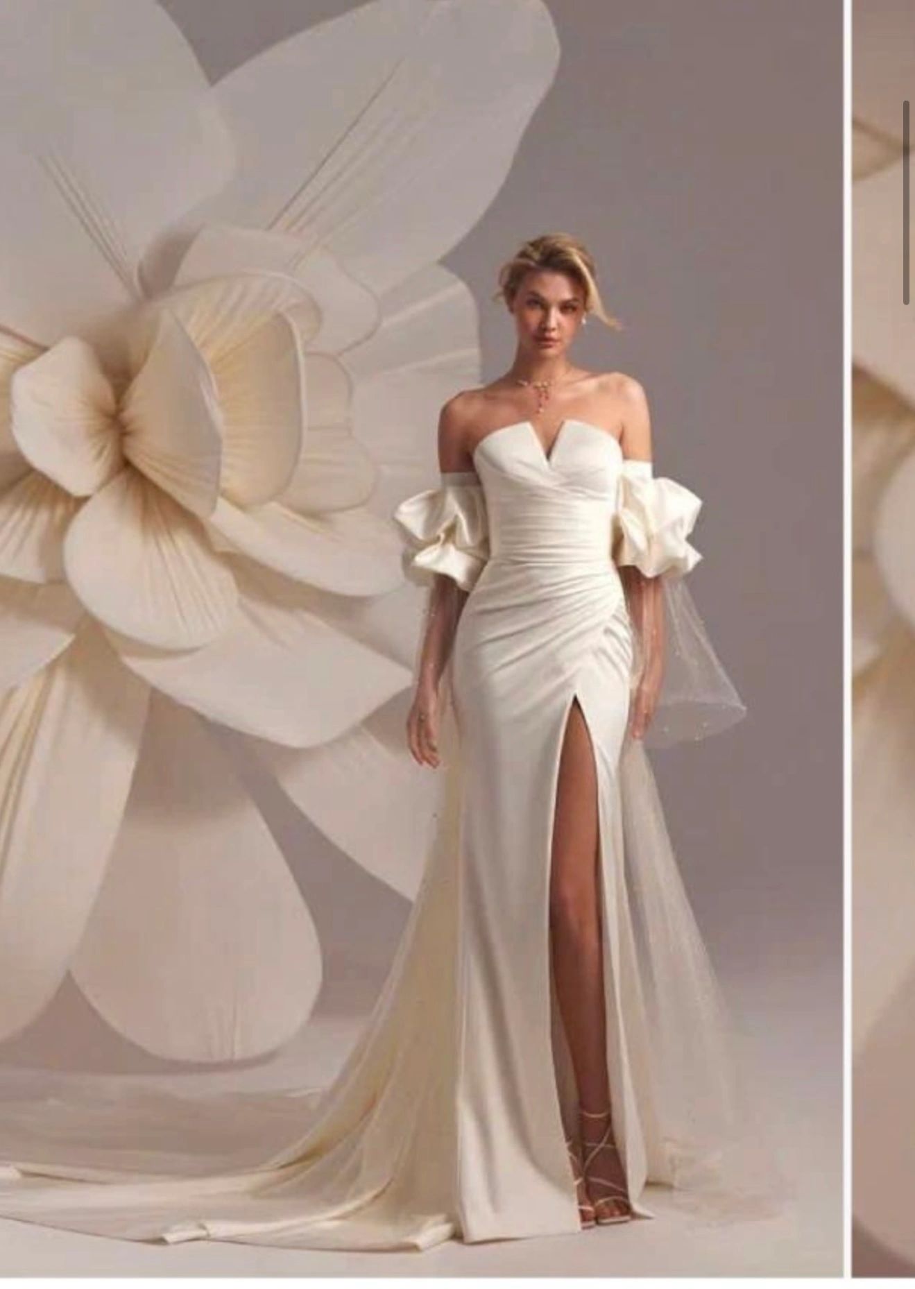 Runway wedding gown with slit