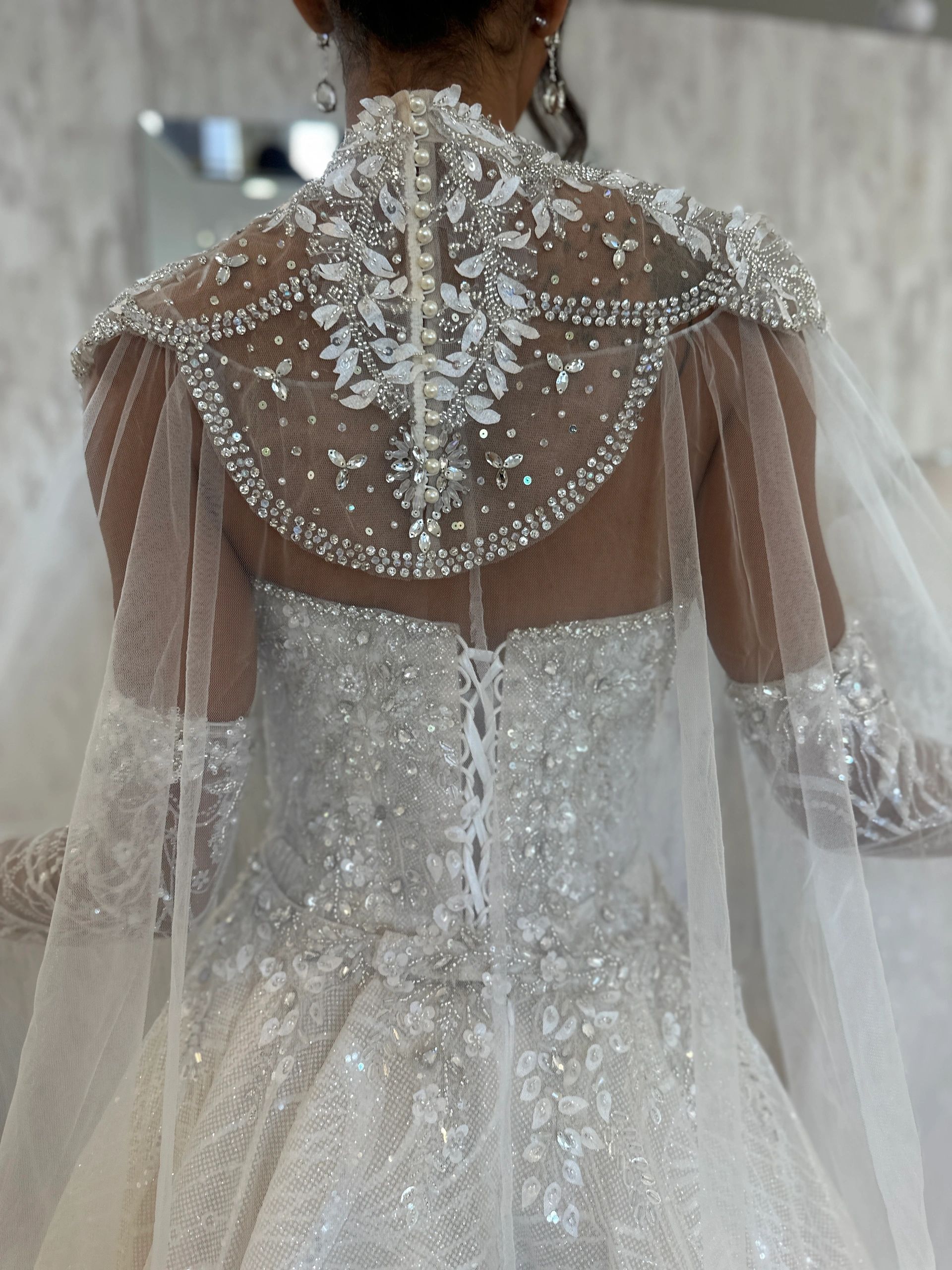 Sheer back wedding gown detail