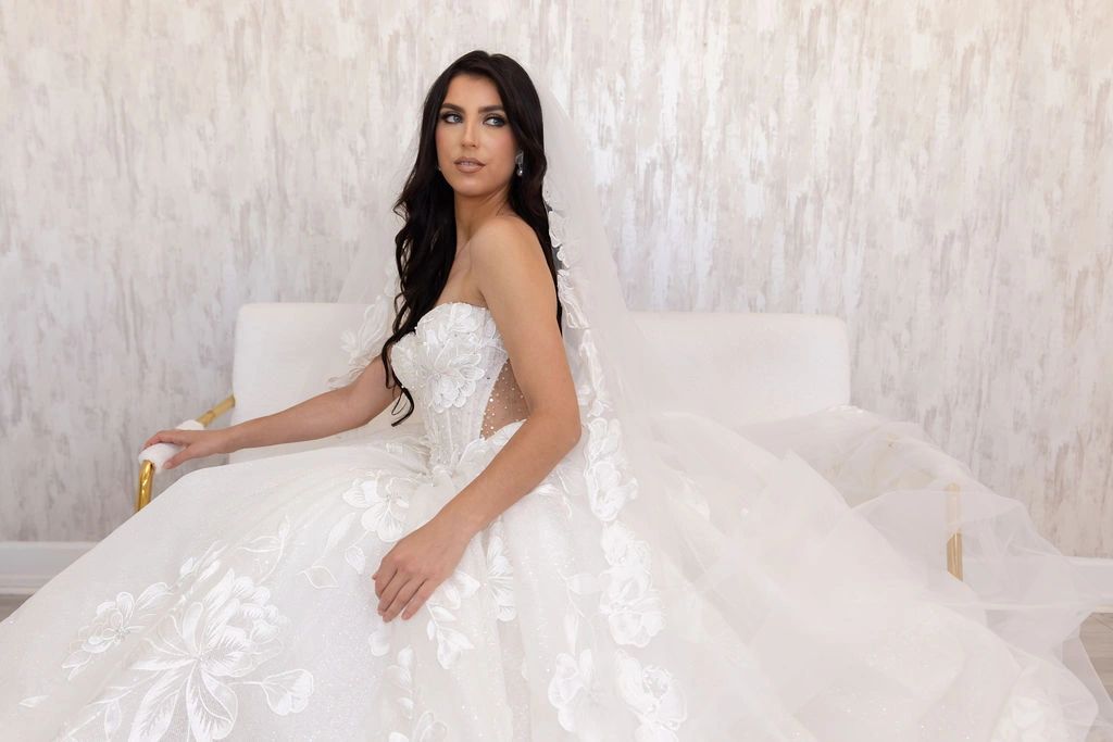 Seated bride in a ballgown